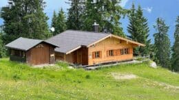 Holzhaus in den Alpen finanzieren